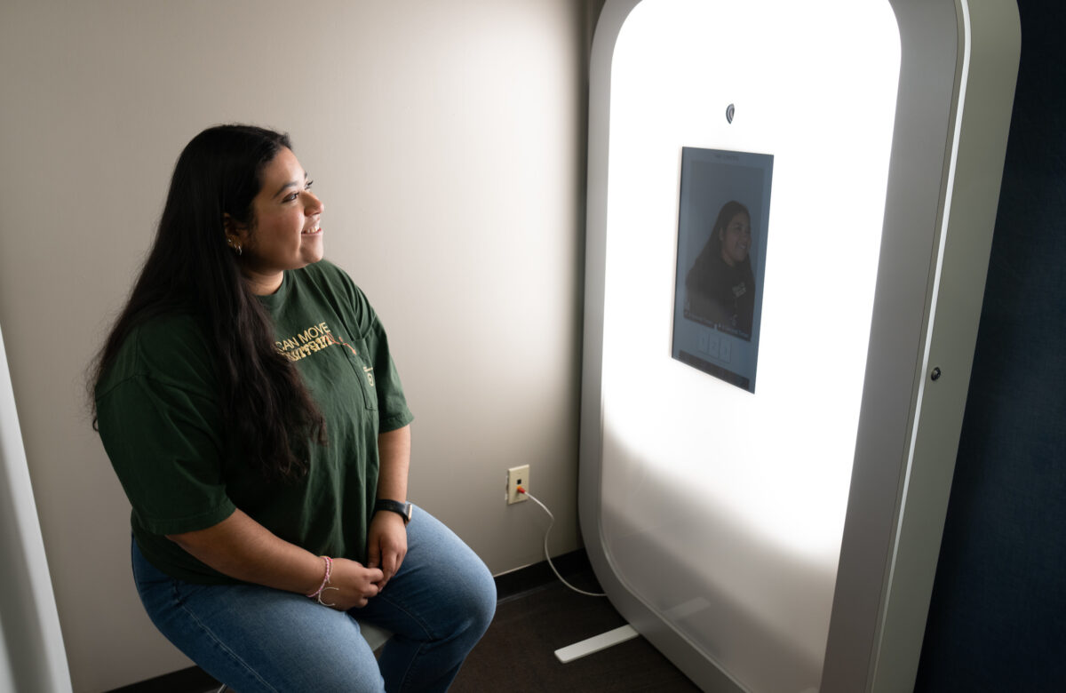 Edith Rodriguez, a student career advisor, poses in the IRIS Pod in the Career Center at the ESTAC Building on the Edinburg Campus. Another pod is located in the Career Center on the Brownsville Campus. (UTRGV Photo by David Pike)